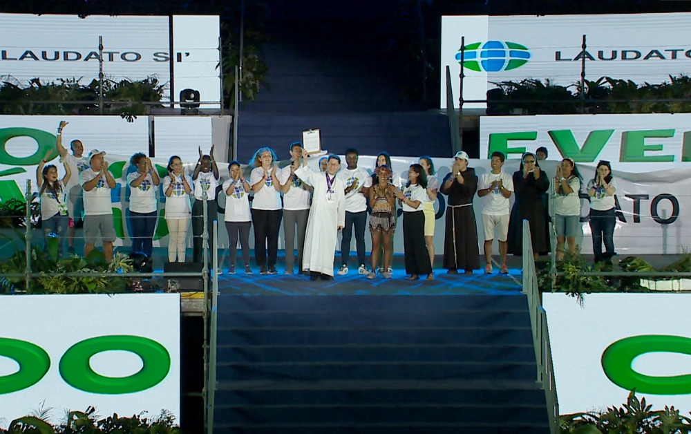 Cardinal Luis Tagle receives the Laudato Si' Generation manifesto during World Youth Day in Panama in January. (Laudato Si' Generation)