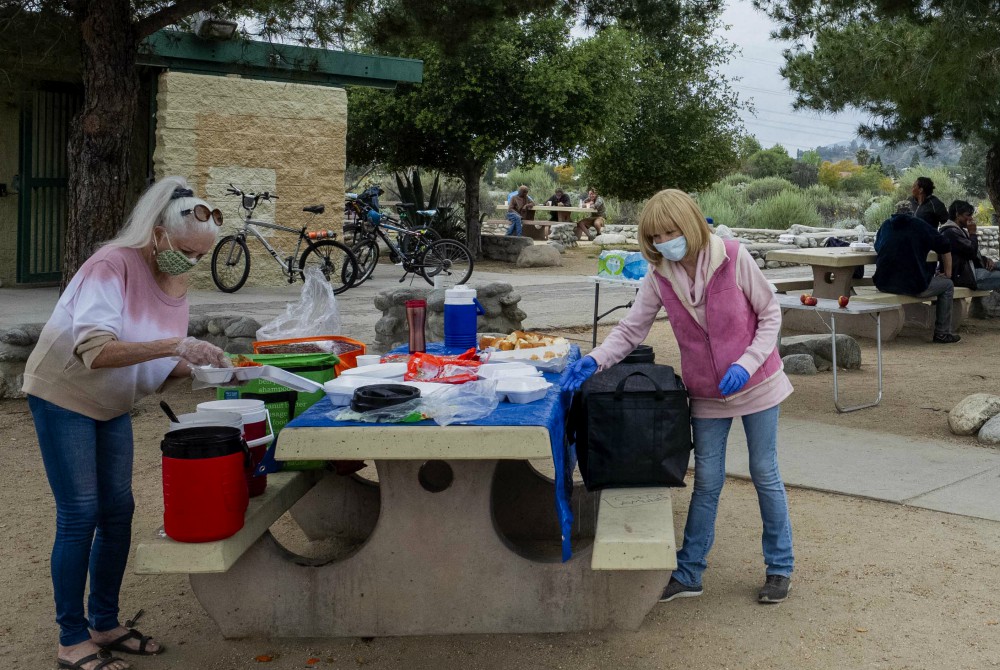 Mater Dolorosa volunteers prepare to serve people experiencing homelessness in Lario Park in Azusa, California. (Michael Cunningham, OSF)