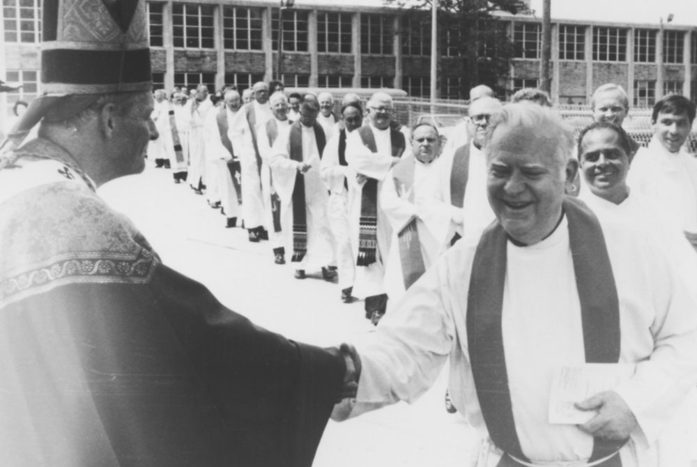 Theodore McCarrick, left, arrives at the Cathedral of the Sacred Heart for his installation as archbishop of Newark, New Jersey, in 1986. (CNS/D.J. Zehnder)