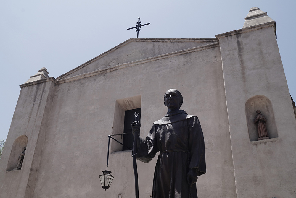 A statue of Franciscan Fr. Junípero Serra is seen outside Mission San Gabriel in San Gabriel, California, in 2018. (Wikimedia Commons/Wraithwriter77)