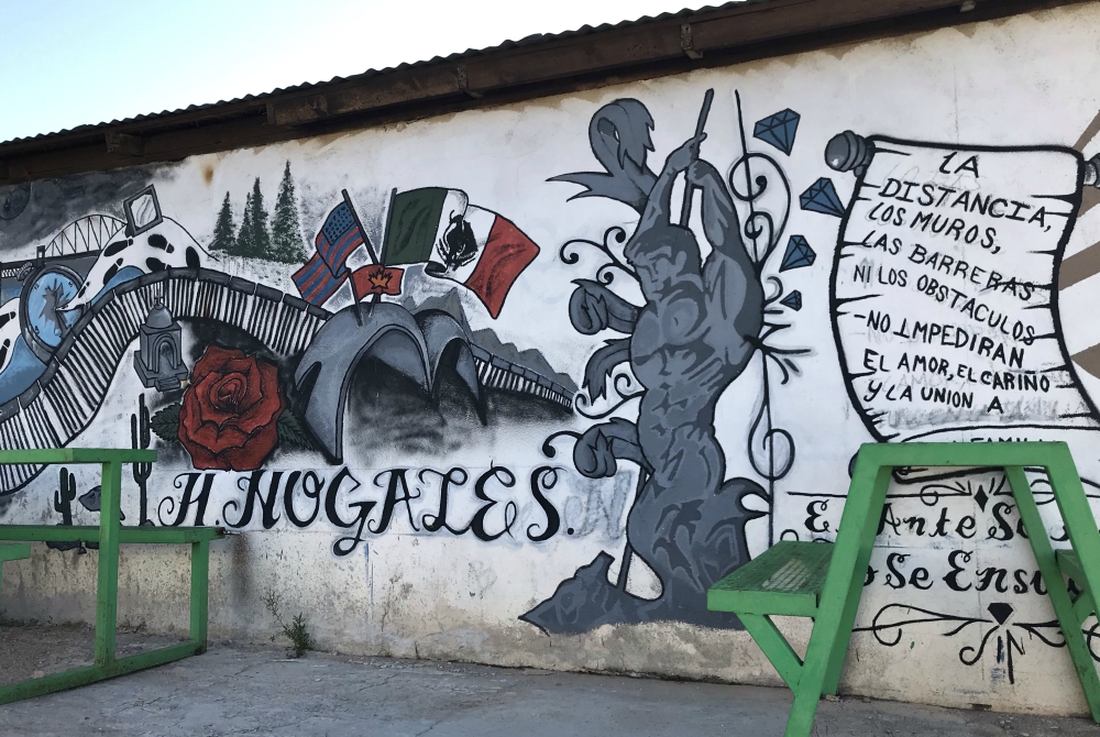 A mural in Sr. Tracey Horan's new neighborhood in Nogales, Sonora, Mexico, reads, "Distance, walls, barriers nor obstacles; they won't impede love, care and union." (Tracey Horan)