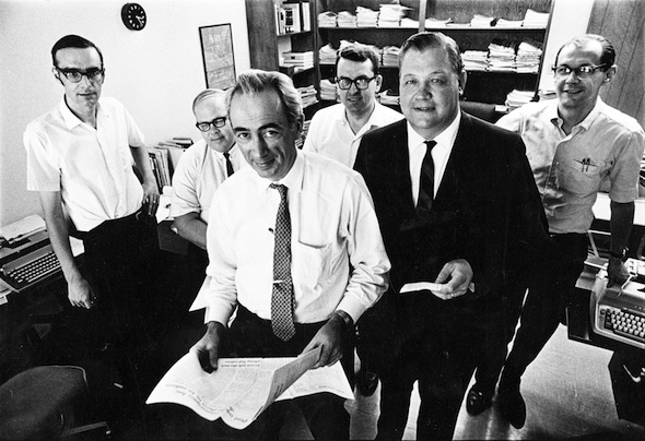 Tom Blackburn, is pictured, back row, left, next to James Andrews, Art Winter and Robert Olmstead, behind NCR editor Robert Hoyt and publisher Donald Thorman (NCR file photo)
