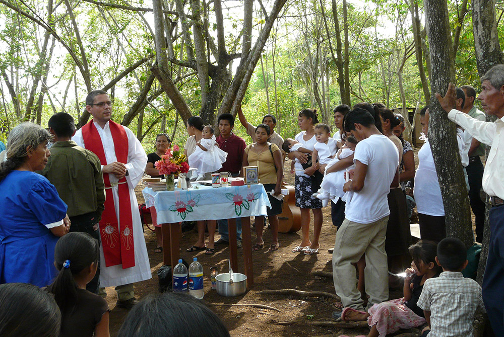Vincentian Fr. Flavio Tercero leads a Mass and baptism for a community near El Naranjo, at the border between Guatemala and Mexico. Tercero repeated to NCR what so many involved with Guatemalan communities insist is key to addressing root causes of migrat