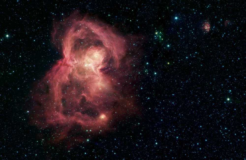 Infrared image from NASA's Spitzer Space Telescope of the W40 nebula — a giant cloud of gas and dust in space where new stars may form (NASA/JPL-Caltech) Infrared image from NASA's Spitzer Space Telescope of the W40 nebula — a giant cloud of gas and dust in space where new stars may form (NASA/JPL-Caltech)