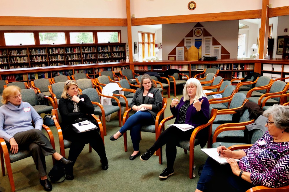 Members of Catholics for Change in Our Church take part in a small-group discussion during the January meeting of the group, which advocates for reform in the Pittsburgh Diocese. (Kevin Hayes)