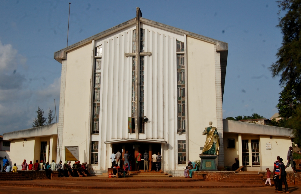 People gather outside St. Peter's Catholic Chaplaincy in Enugu, Nigeria. (Festus Iyorah)