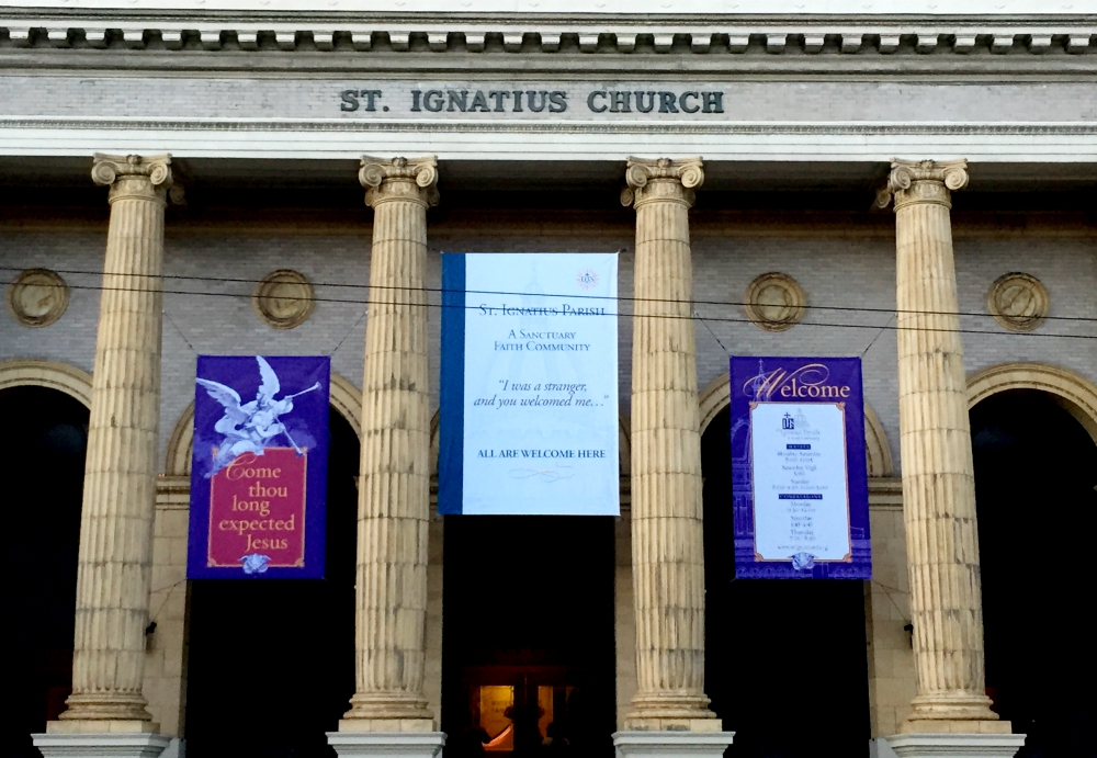 A large banner on San Francisco's St. Ignatius Church declares the parish's status as a sanctuary for migrants, refugees and others "subject to exclusion or removal from this land." (Courtesy of St. Ignatius Parish)