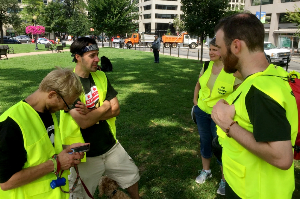 Trained unarmed protectors attend the Unite the Right rally in Washington, D.C., Aug. 12 to accompany counterprotesters and de-escalate violent situations. (Heidi Thompson)