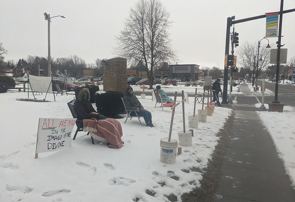 Members of the Romero House community hosted a witness against the death penalty in January 2021 on an intersection in Ames, Iowa. (Courtesy of Matt Mitchell) Members of the Romero House community hosted a witness against the death penalty in January 2021 on an intersection in Ames, Iowa. (Courtesy of Matt Mitchell)