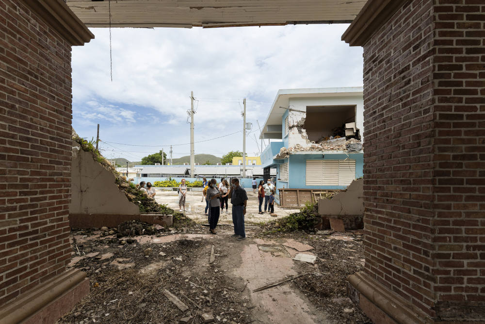 Participants in Catholic Extension's Mission Immersion trip to the dioceses of Puerto Rico visit Immaculate Conception Catholic Church in Guayanilla on June 15, 2022. The church was heavily damaged by an earthquake in January 2020. (RNS photo)