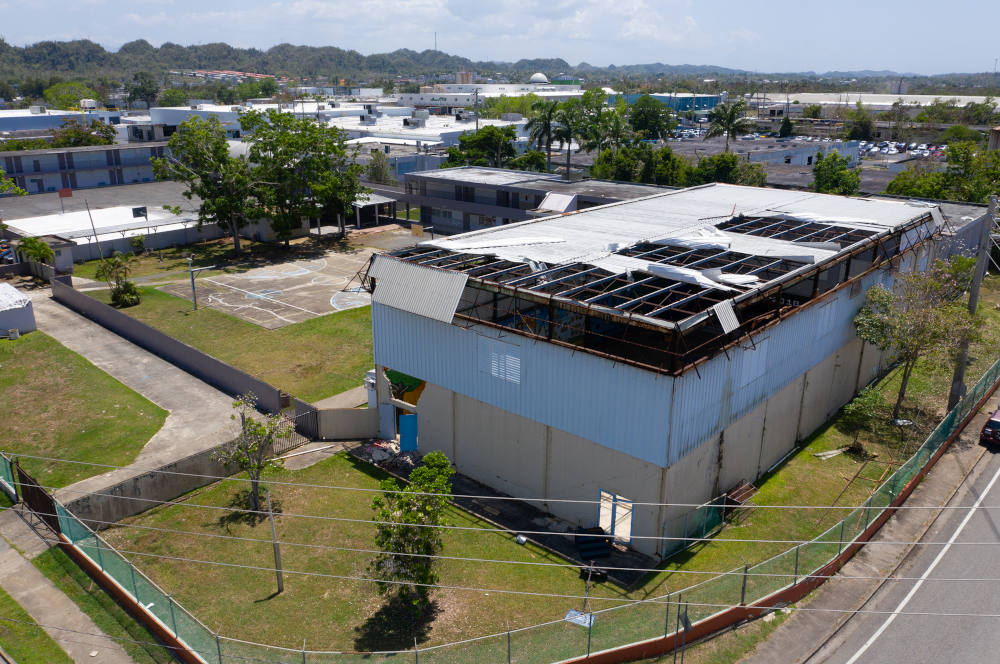 The damaged gymnasium of Colegio Nuestra Señora del Rosario in Vega Baja, Puerto Rico, in 2019. The school was damaged in 2017 by Hurricane Maria. (RNS Photo/courtesy of Catholic Extension.)