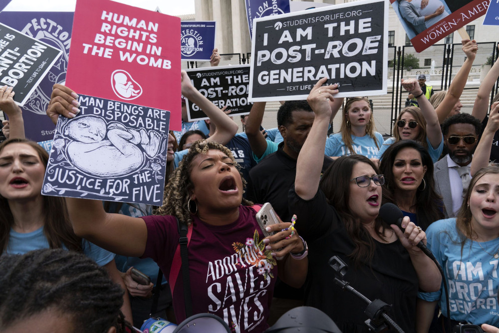 Anti-abortion protesters gather outside the Supreme Court in Washington June 24. (AP/Jose Luis Magana)