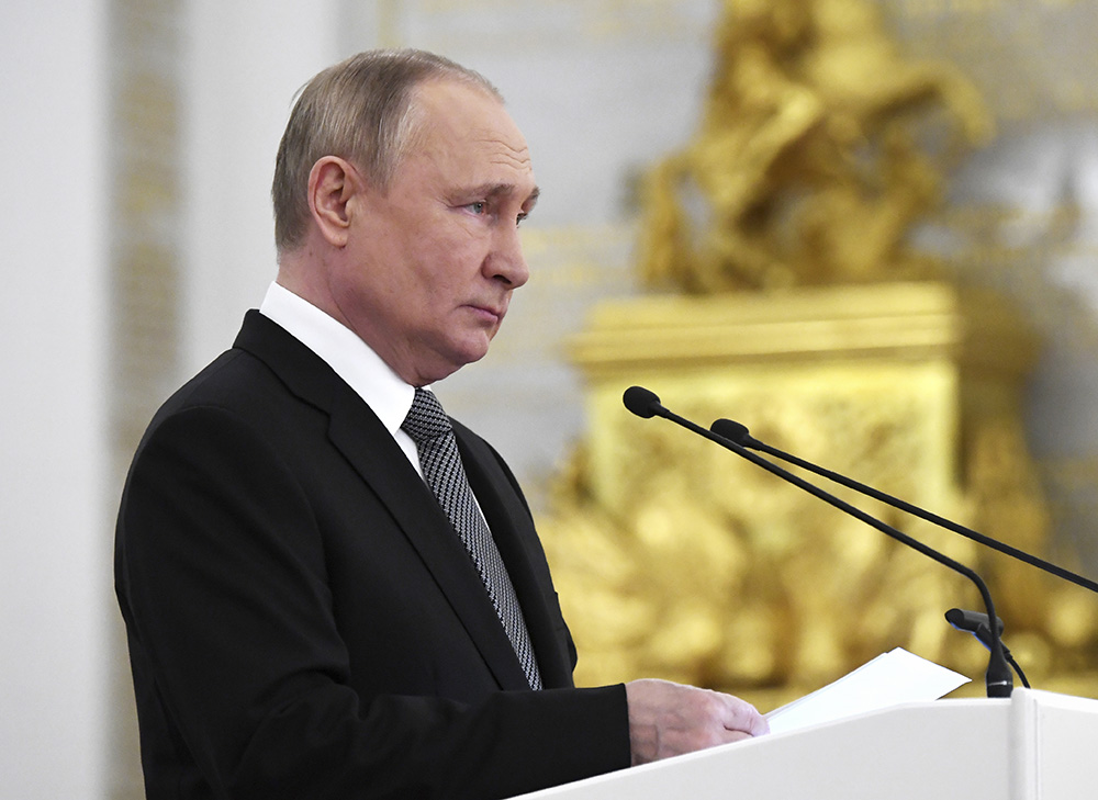 Russian President Vladimir Putin delivers a speech during a meeting with graduates of the country's higher military schools at the Kremlin in Moscow June 21. (AP/Kremlin Pool Photo via AP/Sputnik/Kirill Kallinikov)