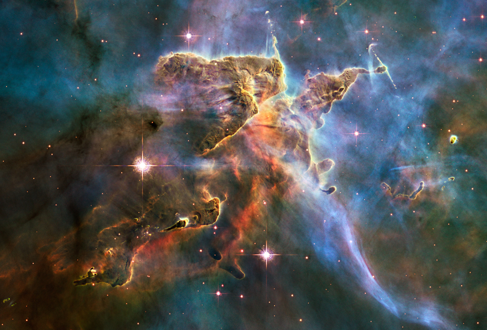 A Hubble photo shows but a small portion of one of the largest seen star-birth regions in the galaxy, the Carina Nebula. (Photo courtesy of NASA, ESA, and M. Livio and the Hubble 20th Anniversary Team (STScI) )