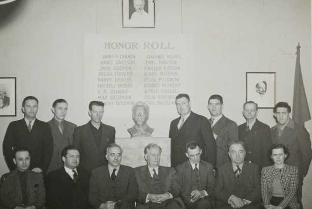 Grace Holmes Carlson (front row, far right) poses with 14 of the 18 activists convicted of trying to overthrow the government under the 1940 Smith Act. Carlson went to prison in 1943. (Minnesota Historical Society, CC BY-SA 3.0)
