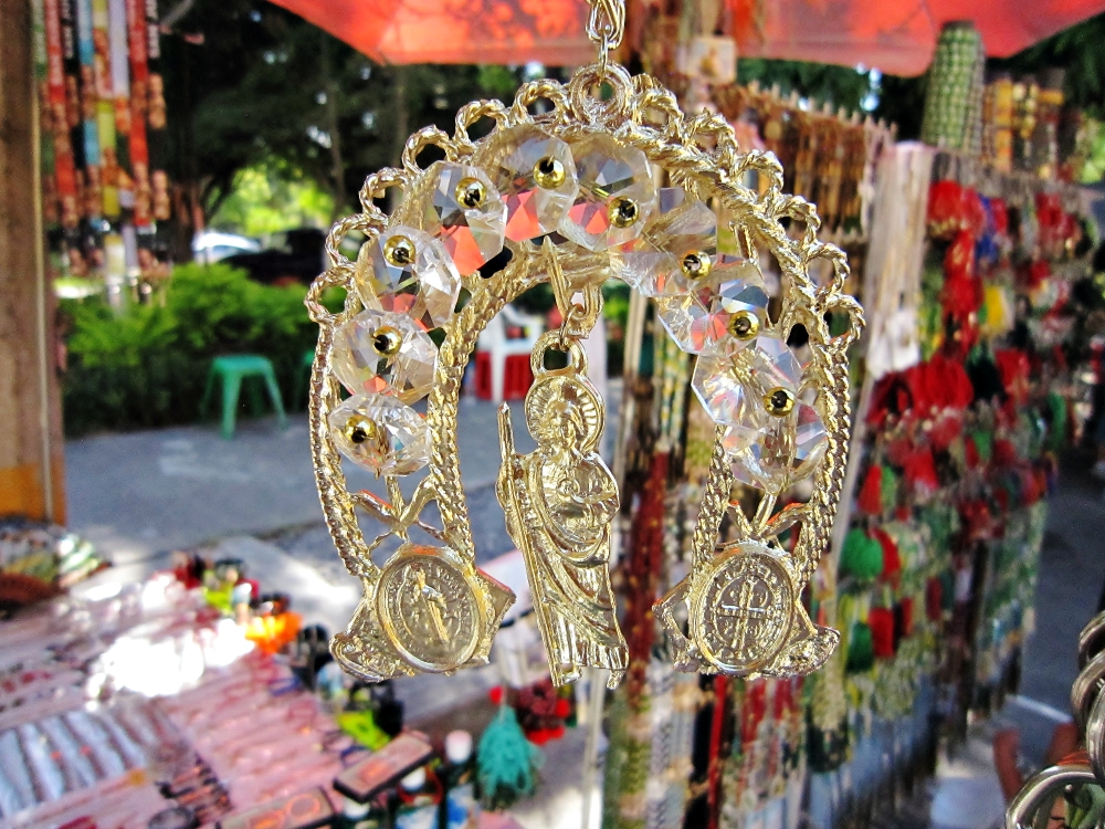 Necklaces and other jewelry featuring the image of St. Jude Thaddeus are sold outside of the Guadalajara parish that bears his name. (Stephen Woodman)