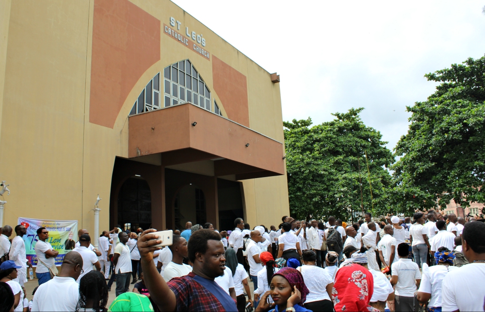 Scores of Catholics stayed outside during the requiem Mass May 22 at St. Leo's Catholic Church in Ikeja, Nigeria, because the 6,000 seats in the church were already taken. (Festus Iyorah)