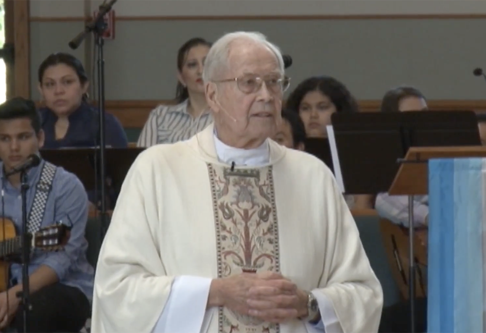 Fr. Michael Gillgannon preaches in Spanish and English during a Mass celebrating his 60 years as a priest on May 6, 2018, at St. Sabina Catholic Church in Belton, Missouri. (NCR screenshot/YouTube/Fr Michael Gillgannon) Fr. Michael Gillgannon preaches in Spanish and English during a Mass celebrating his 60 years as a priest on May 6, 2018, at St. Sabina Catholic Church in Belton, Missouri. (NCR screenshot/YouTube/Fr Michael Gillgannon)