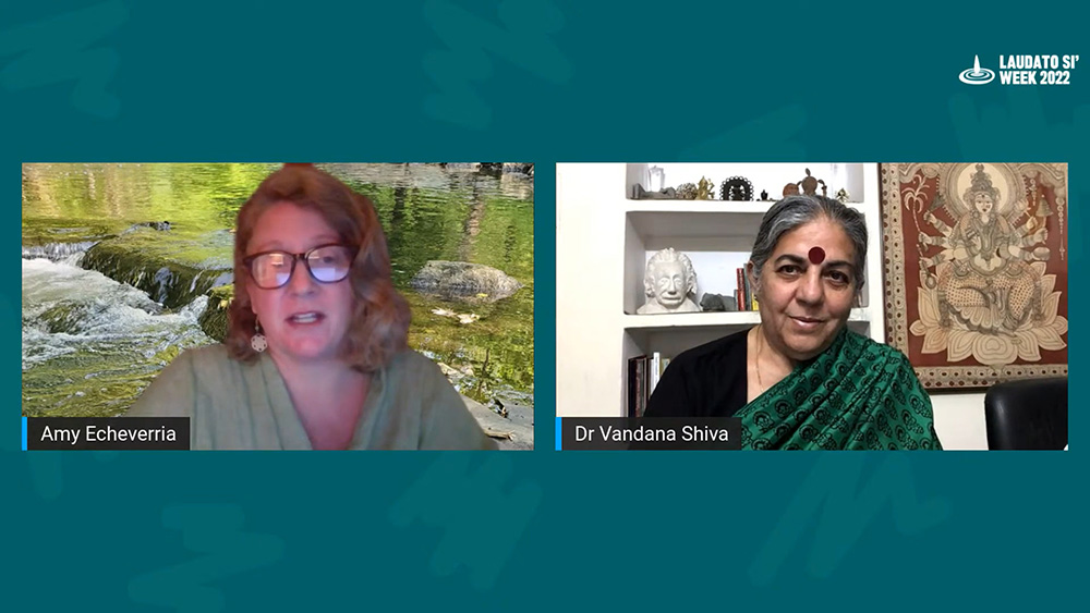 Amy Echeverria (left), international coordinator for justice, peace and ecology for the Missionary Society of St. Columban, introduces sustainable agriculture activist Vandana Shiva for a Vatican-sponsored event on biodiversity May 23.