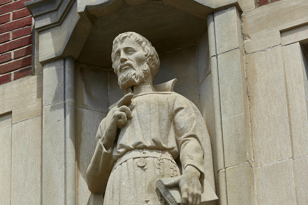 A sculpture of Jesuit Fr. Simon Le Moyne sits in front of Grewen Hall at Le Moyne College in Syracuse, New York. (Courtesy of Le Moyne College) A sculpture of Jesuit Fr. Simon Le Moyne sits in front of Grewen Hall at Le Moyne College in Syracuse, New York. (Courtesy of Le Moyne College)
