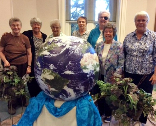 Mercy Sr. Sue Gallagher (second from left) takes part in a presentation on the Season of Creation in September 2019. (Sisters of Mercy)