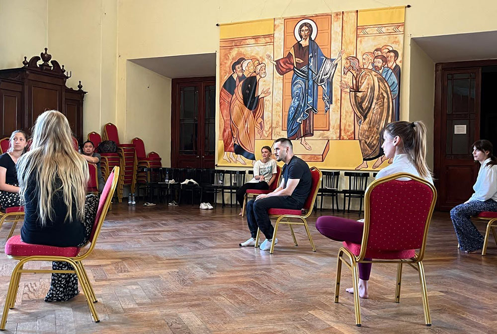 Participants in the Franciscan workshop with Ukrainian actors in Legnica, Poland take part in an acting exercise. (Francisco Javier Castillo Ramirez)