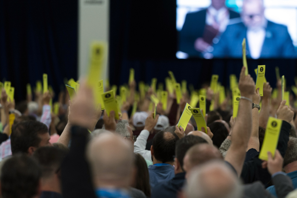 Attendees hold up their ballots during a session at the Southern Baptist Convention's annual meeting in Anaheim, California on June 14. (AP/Jae C. Hong)