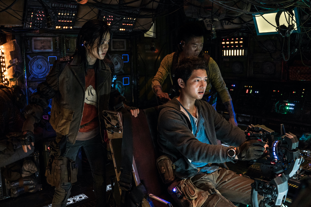 Song Joong-ki, Kim Tae-ri and Jin Seon-kyu in a scene from "Space Sweepers" by director Jo Sung-hee (Netflix) Song Joong-ki, Kim Tae-ri and Jin Seon-kyu in a scene from "Space Sweepers" by director Jo Sung-hee (Netflix)
