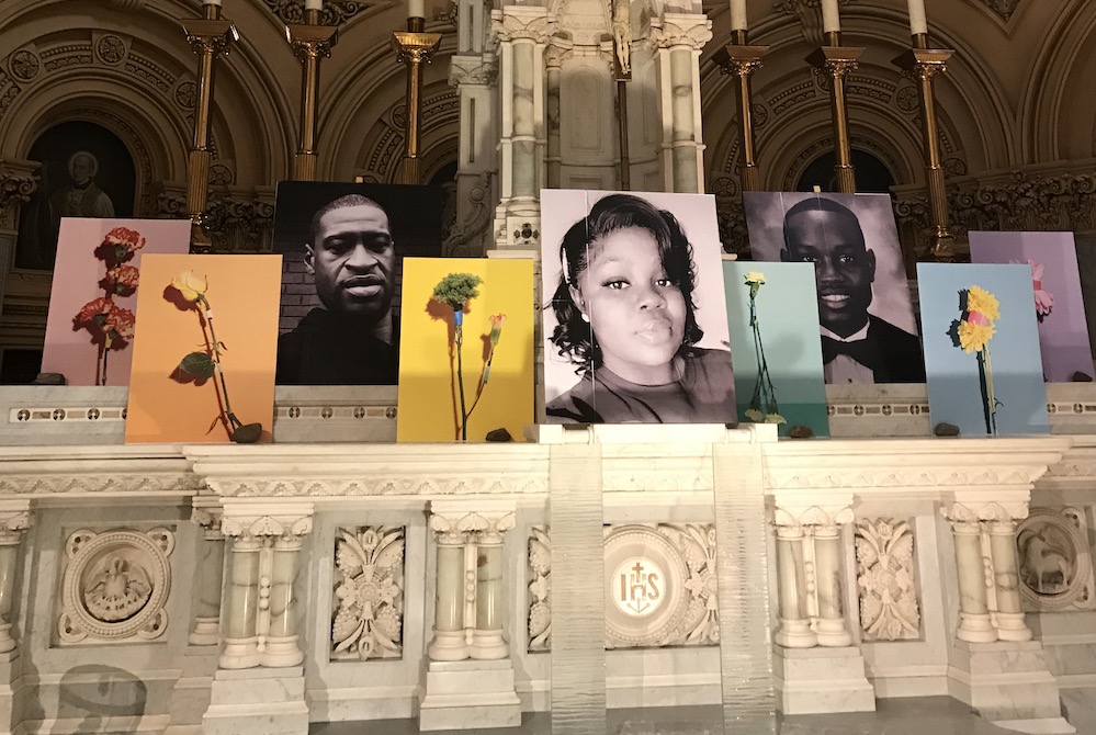 Past view of altar of St. Francis Xavier Church, with photograph of George Floyd, Breonna Taylor and Ahmaud Arbery (Courtesy of St. Francis Xavier Church)