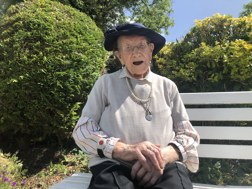 Nancy Stewart pictured in May 2020 at age 107: "I feel so happy and so refreshed, sitting happily in my own armchair in my own kitchen looking at Mass." (Provided photo)