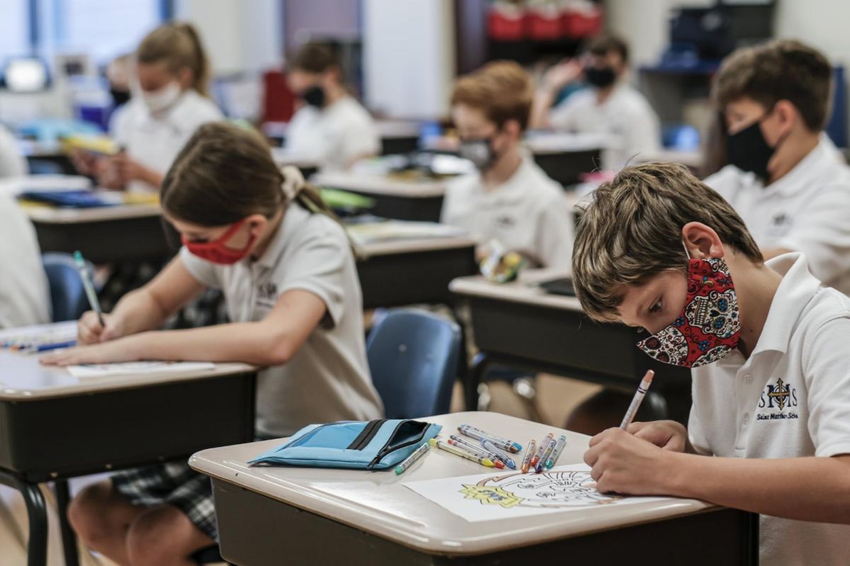 Students work at their desks on the first day of the new school year at St. Matthew School in Franklin, Tenn., Aug. 6, 2020, with extensive COVID-19 protocols in place, including temperature screening and mandatory face masks for each student. (CNS photo/