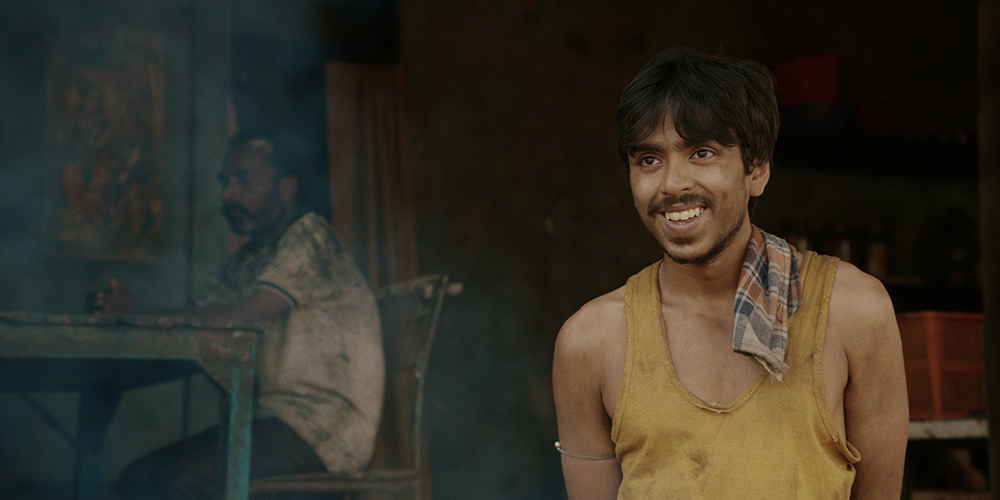 Adarsh Gourav as Balram in "The White Tiger" (Netflix ©2021) Adarsh Gourav as Balram in "The White Tiger" (Netflix ©2021)