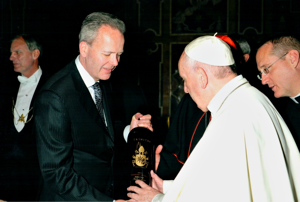 Tim Busch presents Pope Francis with a bottle of "Cabernet FRANCis," made with only Franc grapes at the Busch family's Trinitas Cellars winery in Napa, California. (Courtesy of Napa Institute)