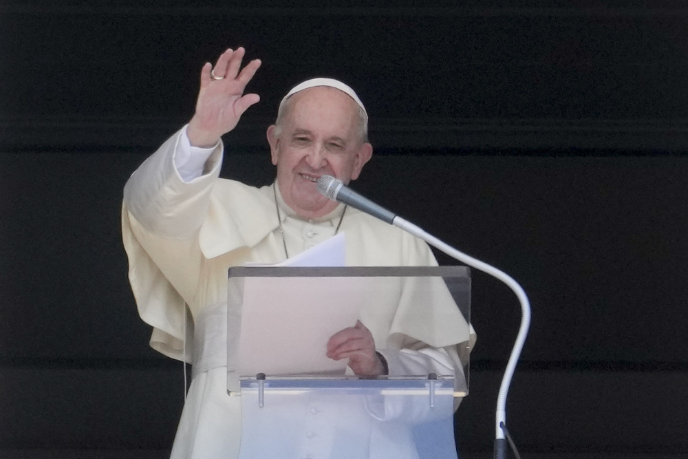 Pope Francis delivers his blessing as he recites the Angelus noon prayer from the window of his studio overlooking St. Peter's Square at the Vatican Sept. 5, 2021. (AP/Andrew Medichini)