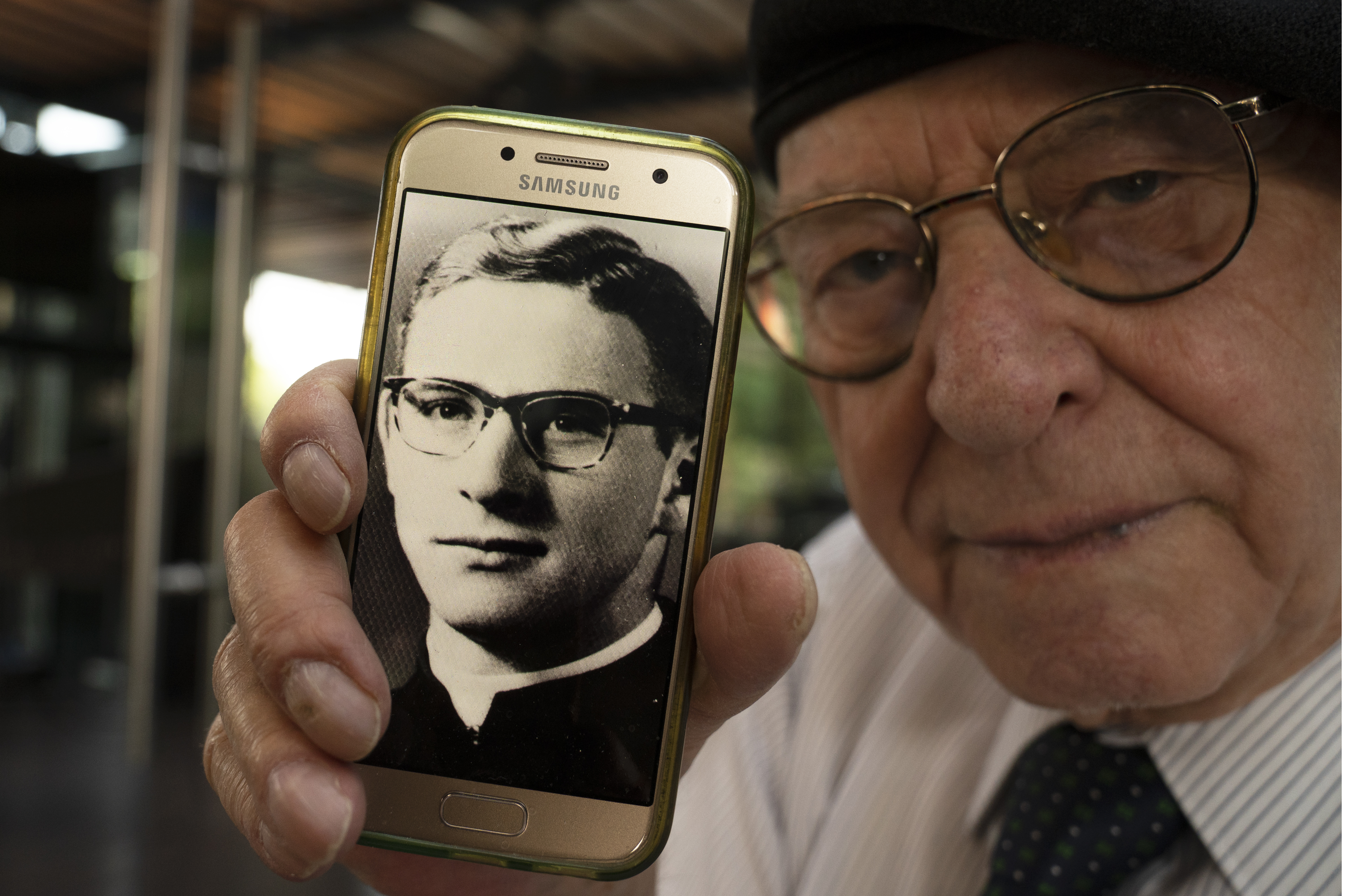 Jose Barba shows a photo of himself when he was a 18-year-old seminarian student, Mexico City, Feb. 22, 2022. (AP Photo/Marco Ugarte) Jose Barba shows a photo of himself when he was a 18-year-old seminarian student, Mexico City, Feb. 22, 2022. (AP Photo/Marco Ugarte)