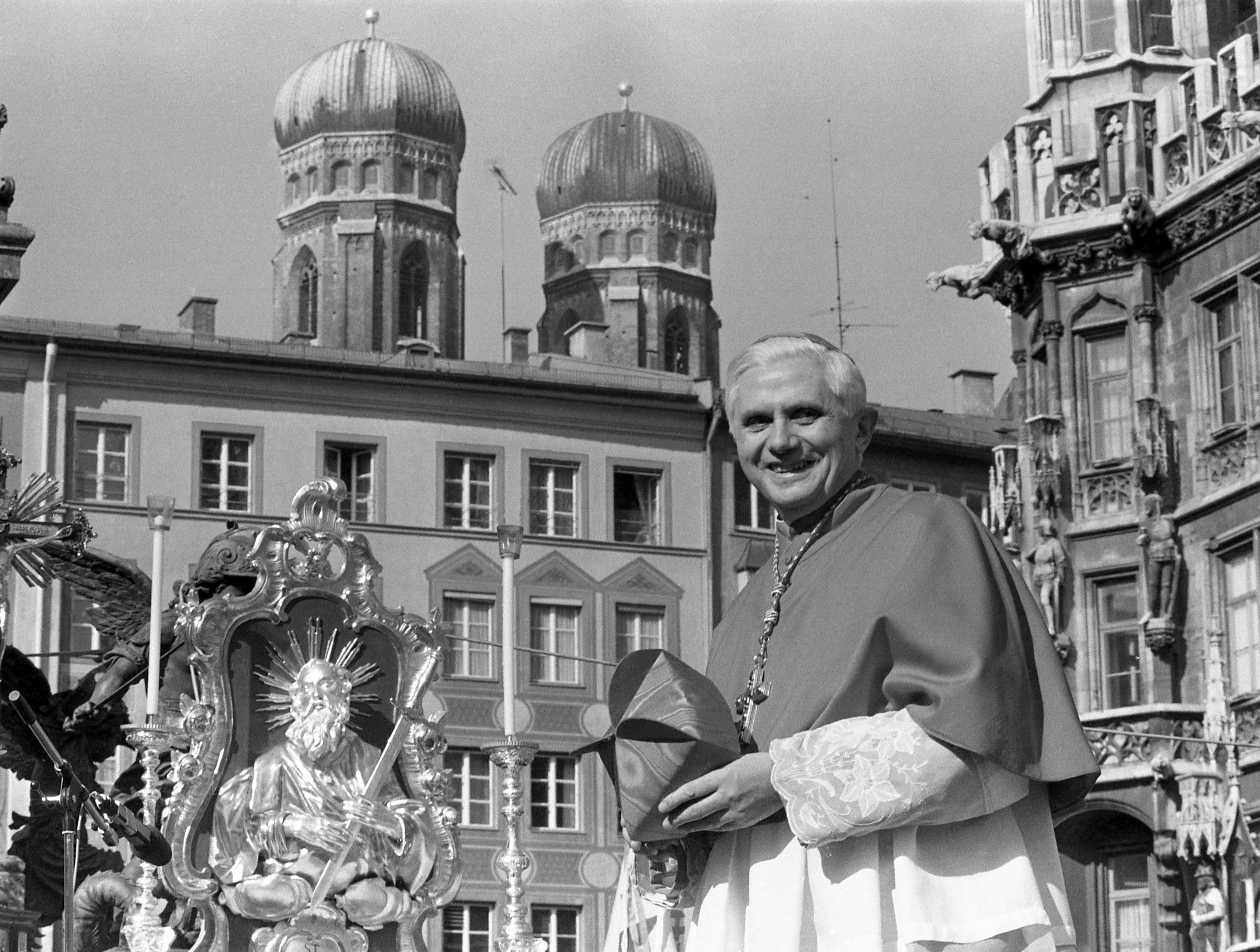 Cardinal Joseph Ratzinger, later Pope Benedict XVI, bids farewell to the Bavarian believers in downtown Munich, Germany, Sunday, Feb. 28, 1982. (AP Photo/Dieter Endlicher, File)