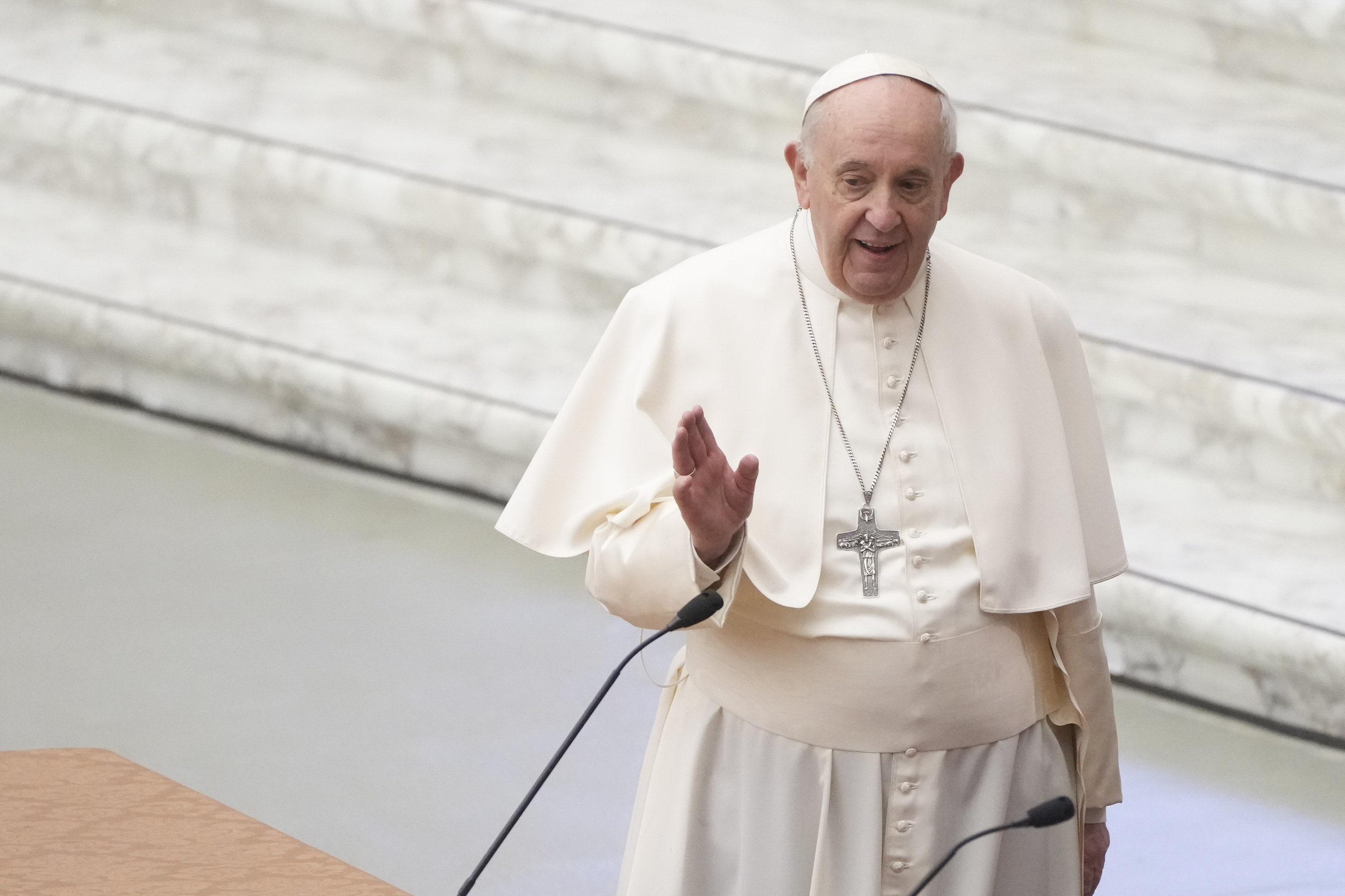 Pope Francis arrives at the opening of a 3-day Symposium on Vocations in the Paul VI hall at the Vatican, Thursday, Feb. 17, 2022. (AP Photo/Gregorio Borgia)