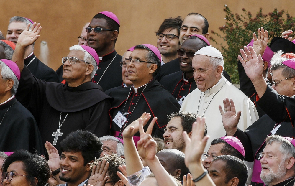 Pope Francis poses for a group photo with bishops and participants at the Synod of Bishops on young people at the Vatican Oct. 27, 2018. (CNS/EPA/Fabio Frustaci)