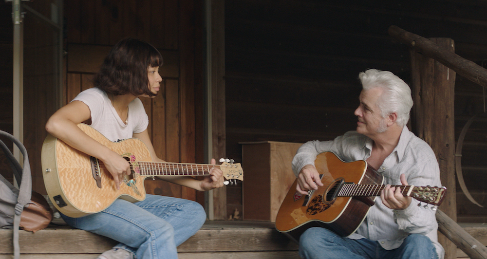 Eva Noblezada, left, as Rosario and Dale Watson as himself in "Yellow Rose" (EPK.TV/Stage 6 Films)