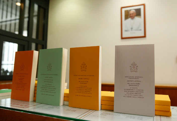 Copies of Pope Francis' apostolic exhortation "Amoris Laetitia" ("The Joy of Love") at the document's release at the Vatican April 8, 2016. (CNS/Paul Haring)