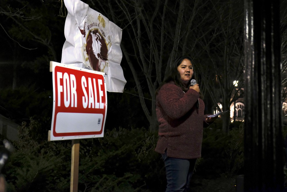 Audrey Kang, a Boston College student, speaks at a rally that was organized Nov. 14 by Climate Justice for Boston College and other campus groups against the college administration's acceptance of Koch Foundation funding. (RNS/Aysha Khan)