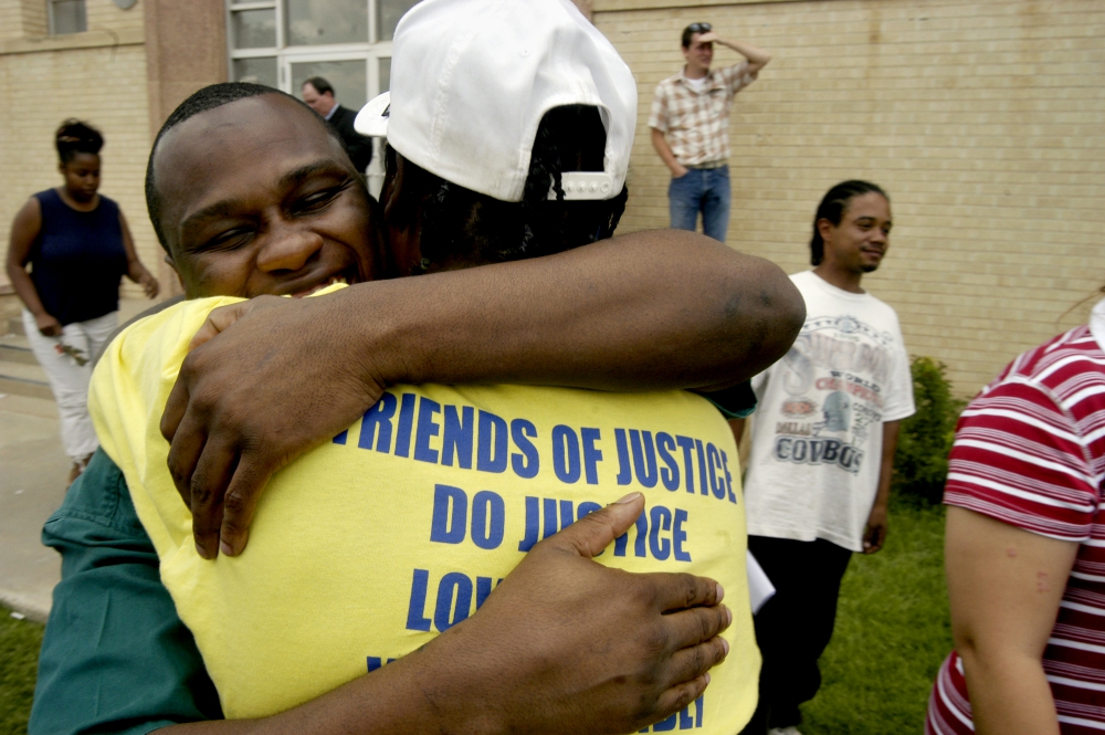 James Barrow hugs a well-wisher as he leaves Swisher County Courthouse in Tulia, Texas, in June 2003 after being released from prison pending appeal on charges in connection with a July 1999 drug bust.