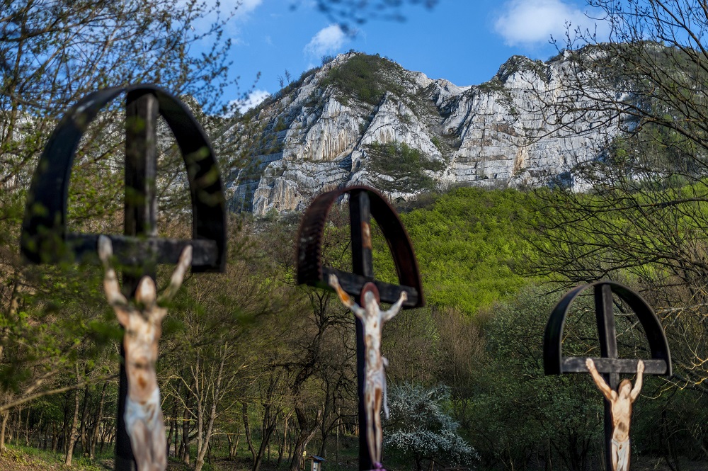 Crucifixes are seen near a closed limestone mine near Belapatfalva, Hungary.