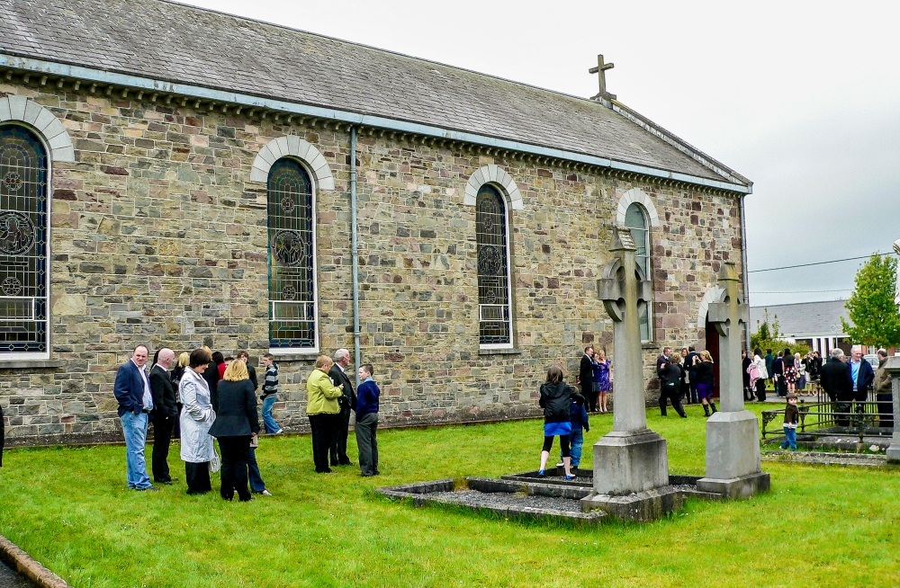 People chat after Mass outside a parish church in a small village in Ireland. (Dreamstime/Imagoinsulae) People chat after Mass outside a parish church in a small village in Ireland. (Dreamstime/Imagoinsulae)