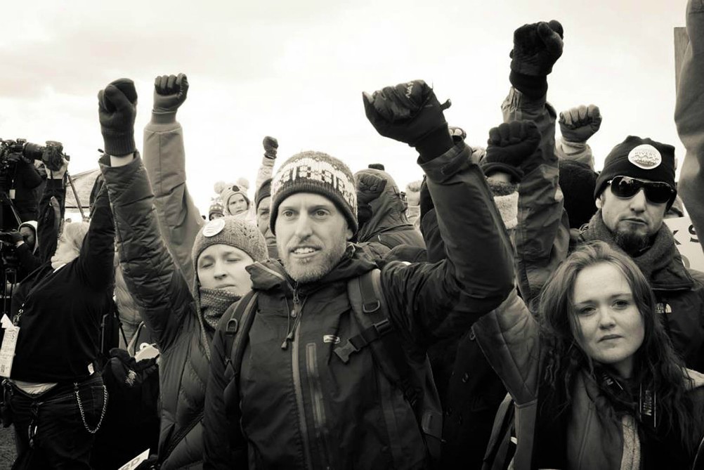 Phil Aroneanu, Dayenu’s chief strategist, joins a protest against the Keystone Pipeline XL in Washington, D.C. (Courtesy of Dayenu) Phil Aroneanu, Dayenu’s chief strategist, joins a protest against the Keystone Pipeline XL in Washington, D.C. (Courtesy of Dayenu)