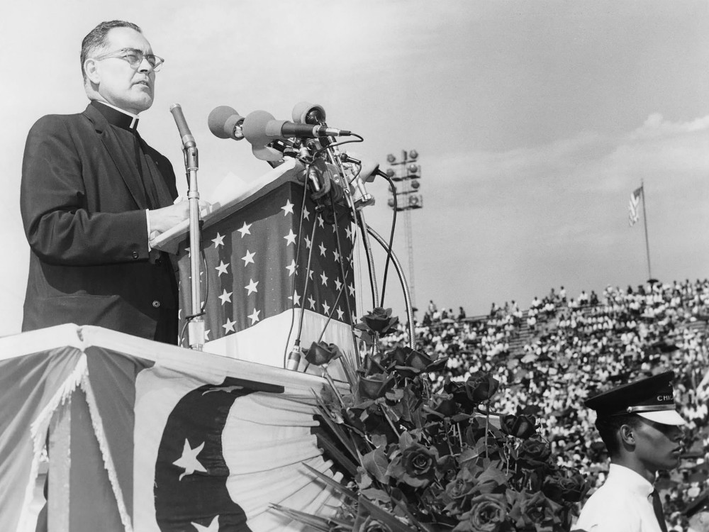 Holy Cross Fr. Theodore Hesburgh speaks at the Illinois Rally for Civil Rights in Chicago in 1964. (OCP Media)