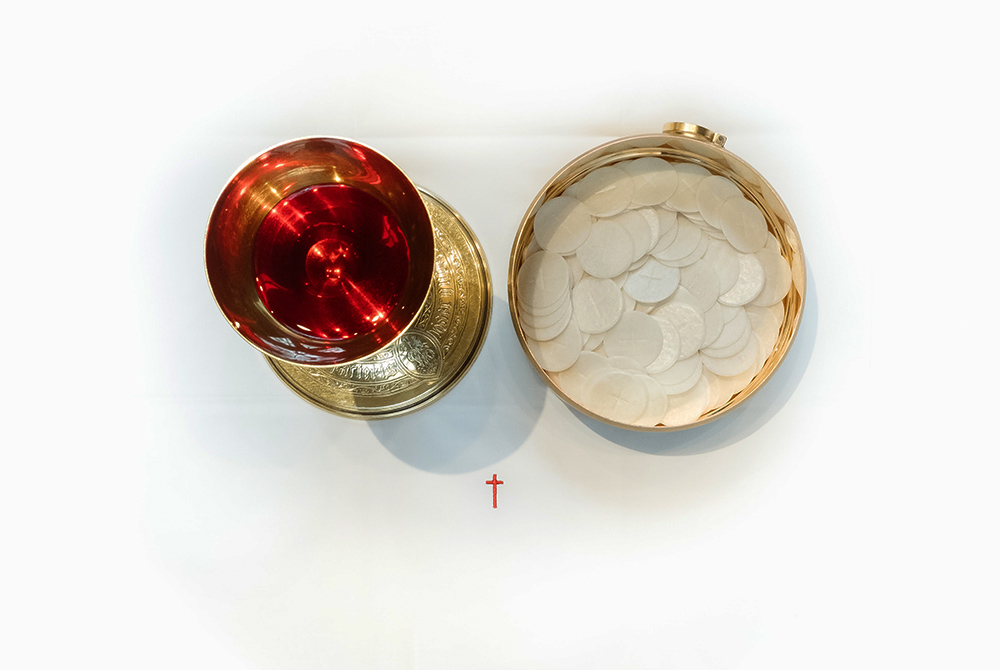 Eucharist photo illustration (Unsplash/Josh Applegate)