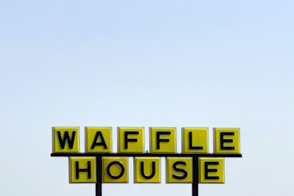 Waffle House sign (Unsplash/Nikhil Mistry)
