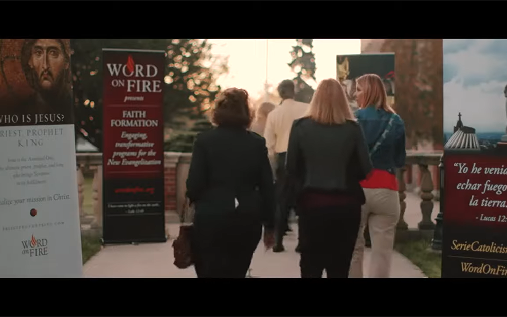 People are seen walking to a Word on Fire event in a promotional video on the Word on Fire Institute website. (NCR screengrab/YouTube/Word on Fire Institute) People are seen walking to a Word on Fire event in a promotional video on the Word on Fire Institute website. (NCR screengrab/YouTube/Word on Fire Institute)