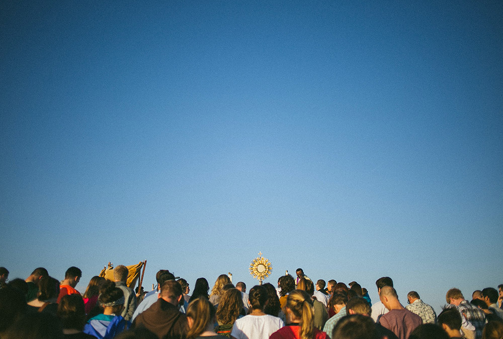 Students at St. John XXIII Catholic Parish process with the Eucharist across Colorado State University in Fort Collins in 2018. In November 2021, the U.S. bishops announced plans for a three-year National Eucharistic Revival. (Unsplash/Rachel Moore)